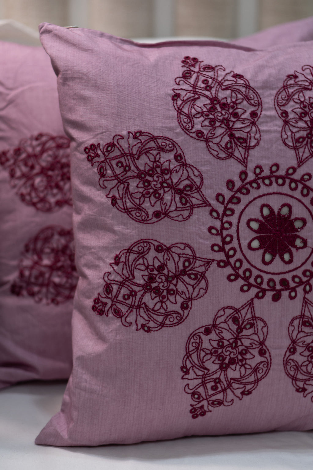 Our Embroidery Cushion with Intricately embroidered mandala motifs. Schiffli Embroidered Cushions with cutwork.