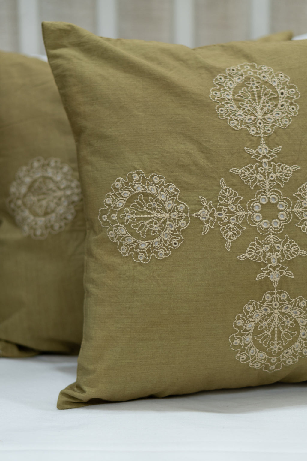 Our Embroidery Cushion with Intricately embroidered mandala motifs. Schiffli Embroidered Cushions with cutwork.