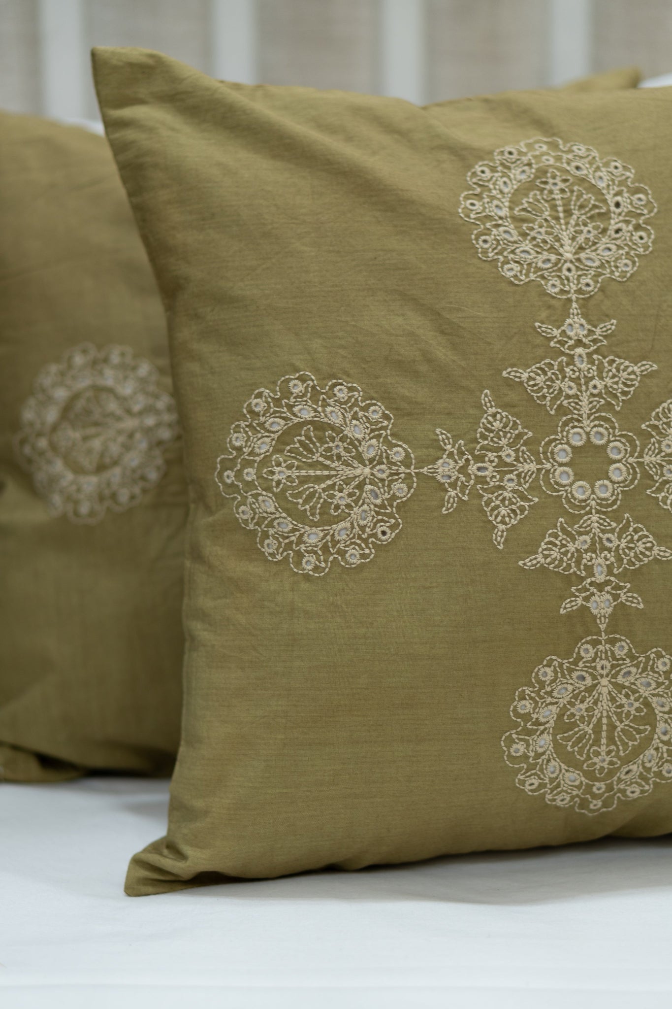 Our Embroidery Cushion with Intricately embroidered mandala motifs. Schiffli Embroidered Cushions with cutwork.